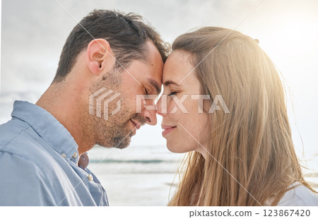 Travel, love and couple relax at sunset, embracing in intimate moment on a beach vacation in Florida. Happy, face and caring man relaxing with woman in Mexico, enjoy romance and ocean trip together Travel, love and couple relax at sunset, embracing in intimate moment on a beach vacation in Florida. Happy, face and caring man relaxing with woman in Mexico, enjoy romance and ocean trip together 123867420