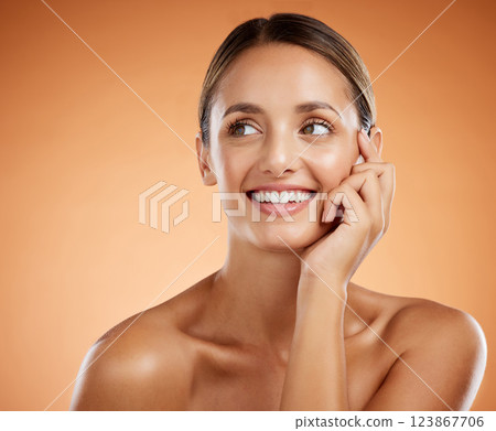 Face, portrait and skincare for beauty woman with smile for facial health against an orange mockup studio background. Cosmetic model happy about natural wellness and dermatology with mock up space 123867706