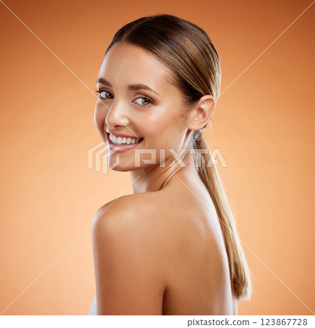 Cosmetics, woman and body for skincare, smile or wellness with brown studio background for wellness. Portrait, female or young girl pose for makeup brand, smooth skin or fresh natural beauty for glow Cosmetics, woman and body for skincare, smile or wellness with brown studio background for wellness. Portrait, female or young girl pose for makeup brand, smooth skin or fresh natural beauty for glow 123867728