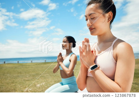 Fitness, yoga and woman in spiritual wellness, exercise and training workout for mental wellbeing in nature. Women in meditation pose on grass in calm, peace and zen for healthy mind, body and spirit Fitness, yoga and woman in spiritual wellness, exercise and training workout for mental wellbeing in nature. Women in meditation pose on grass in calm, peace and zen for healthy mind, body and spirit 123867878