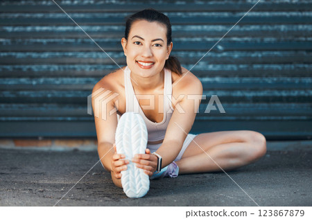 Fitness, woman and stretching with smile on street for warm up exercise, workout and health in the outdoors. Active female in leg stretch for healthy sports training or practice for cardio routine Fitness, woman and stretching with smile on street for warm up exercise, workout and health in the outdoors. Active female in leg stretch for healthy sports training or practice for cardio routine 123867879