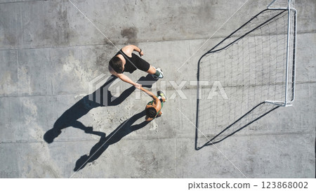 Soccer, sports and handshake with a man and woman athlete shaking hands after a game on a rooftop from above. Football, exercise and training with a male and female playing a match for health 123868002