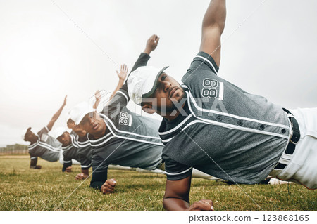 Baseball, sports and collaboration with a team stretching for a game or match on a field. Sport, fitness and exercise with a male athlete group in a warmup before training on grass for a workout 123868165