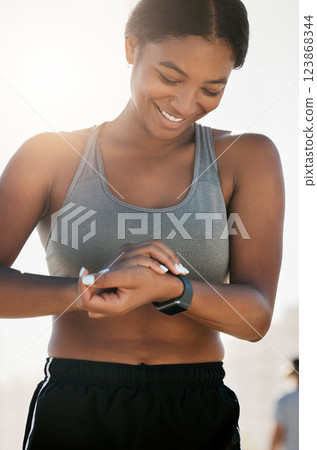 Fitness, smartwatch and training with black woman in outdoor for running, health and sports workout. Exercise, energy and time with girl and technology for lifestyle, wellness and performance monitor Fitness, smartwatch and training with black woman in outdoor for running, health and sports workout. Exercise, energy and time with girl and technology for lifestyle, wellness and performance monitor 123868344