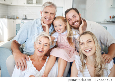 Photo, portrait and big family with smile in their house together in the living room. Happy elderly people with girl child, mother and father for love and happiness in the lounge of their home Photo, portrait and big family with smile in their house together in the living room. Happy elderly people with girl child, mother and father for love and happiness in the lounge of their home 123868393