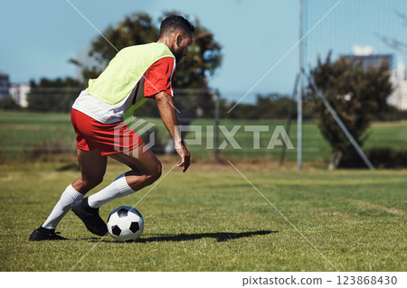 Man, running or soccer ball on grass field for sports, training or workout in competition match. Football player, athlete or fitness person in workout, training or exercise for wellness or speed game Man, running or soccer ball on grass field for sports, training or workout in competition match. Football player, athlete or fitness person in workout, training or exercise for wellness or speed game 123868430