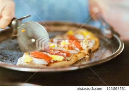 Sliced and served hawaiian mini pizza 123868561