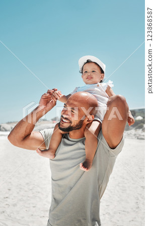 Travel, family and baby and father at a beach in Florida, relax, bonding and having fun in summer on vacation. Love, girl and cheerful parent walking and enjoying fresh air at the ocean in Mexico Travel, family and baby and father at a beach in Florida, relax, bonding and having fun in summer on vacation. Love, girl and cheerful parent walking and enjoying fresh air at the ocean in Mexico 123868587