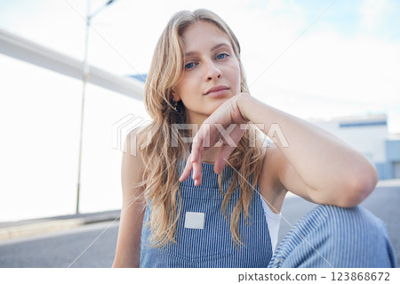 Fashion, beauty and city with a model woman outdoor on the road or street for contemporary and edgy style. Portrait, trendy and clothes with an attractive or stylish young female in an urban town Fashion, beauty and city with a model woman outdoor on the road or street for contemporary and edgy style. Portrait, trendy and clothes with an attractive or stylish young female in an urban town 123868672