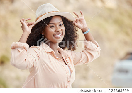 Happy black woman on holiday, spring portrait on outdoor adventure and weekend lifestyle in Los Angeles. Summer fashion sun hat, young african girl on urban vacation and happiness in natural park Happy black woman on holiday, spring portrait on outdoor adventure and weekend lifestyle in Los Angeles. Summer fashion sun hat, young african girl on urban vacation and happiness in natural park 123868799