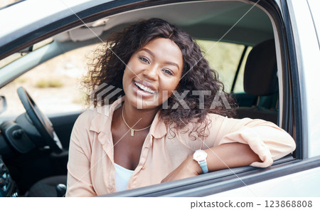 Black woman, car and smile of a relax person from Jamaica on a road trip with motor transport. Portrait of a happy and relax female in a vehicle enjoying a summer day with transportation travel Black woman, car and smile of a relax person from Jamaica on a road trip with motor transport. Portrait of a happy and relax female in a vehicle enjoying a summer day with transportation travel 123868808