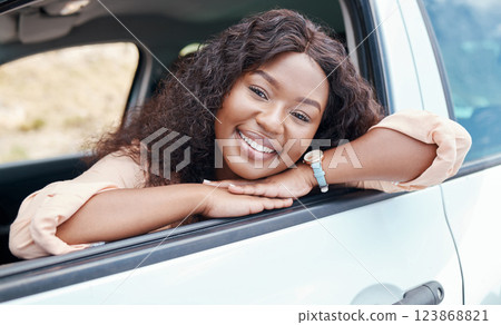 Road trip, black woman travel and car window relax, freedom and summer vacation, outdoor adventure or break. Portrait happy young african girl driving suv for journey, transportation and solo holiday Road trip, black woman travel and car window relax, freedom and summer vacation, outdoor adventure or break. Portrait happy young african girl driving suv for journey, transportation and solo holiday 123868821