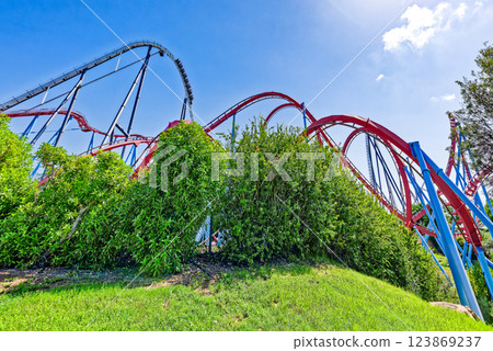 Roller Coaster in funny amusement park. Roller Coaster in funny amusement park. 123869237