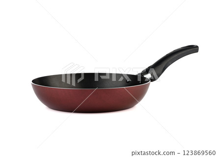 Non-stick frying pan with black handle on white background. Non-stick frying pan with black handle on white background. 123869560