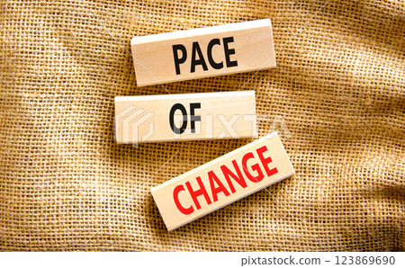 Pace of change symbol. Concept words Pace of change on beautiful wooden blocks. Beautiful canvas table canvas background. Business pace of change concept. Copy space. 123869690