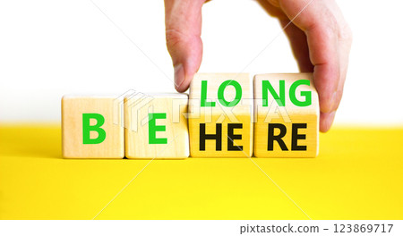 Belonging and belong symbol. Concept words Be here Belong on beautiful wooden block. Beautiful white background Businessman hand. Business motivational belonging and belong concept. Copy space. Belonging and belong symbol. Concept words Be here Belong on beautiful wooden block. Beautiful white background Businessman hand. Business motivational belonging and belong concept. Copy space. 123869717