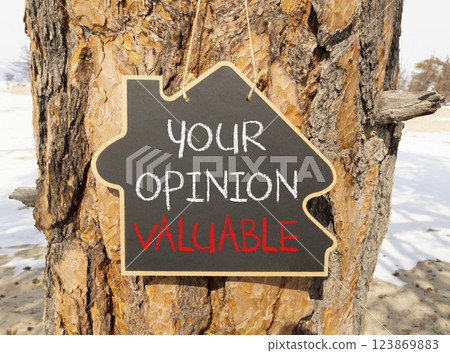 Your opinion valuable symbol. Concept words Your opinion valuable on beautiful black yellow blackboard. Beautiful old wood and sand background. Business your opinion valuable concept. Copy space. 123869883