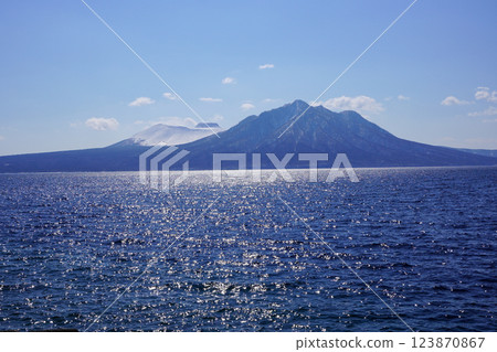 Mount Tarumae and Mount Fuppushi seen from a parking area along Lake Shikotsu Mount Tarumae and Mount Fuppushi seen from a parking area along Lake Shikotsu 123870867