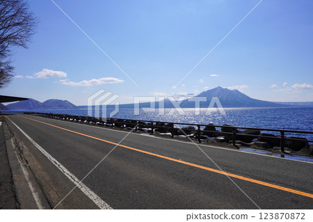 Mount Tarumae and Mount Fuppushi seen from a parking area along Lake Shikotsu 123870872