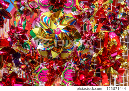 Jan 29 2025 Golden Ornaments on Display with Red Calligraphy 123871444