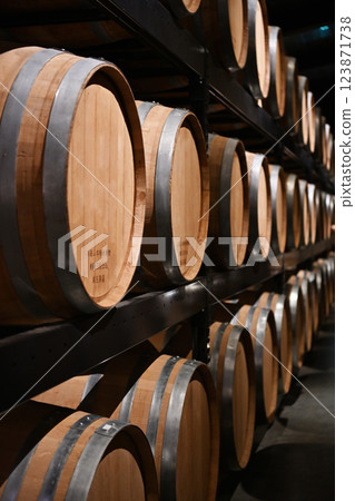 Sake barrels displayed on a shelf 123871738