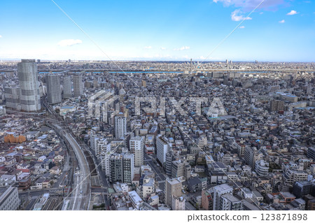 Cityscape View With Skyscrapers and Winding Urban Infrastructure, Tokyo Dec 8 2024 123871898