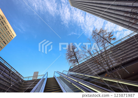 Dec 8 2024 Modern Outdoor Escalator in Urban Environment, Tokyo Dec 8 2024 Modern Outdoor Escalator in Urban Environment, Tokyo 123871987