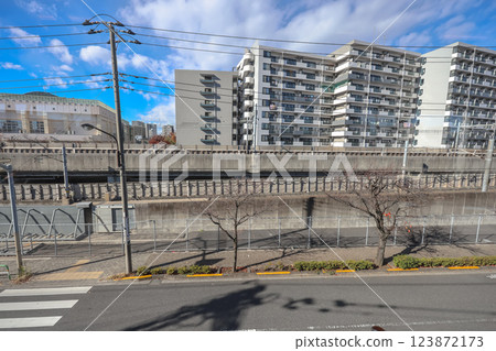 Apartments and Infrastructure with Clear Daytime Sky, Tokyo Dec 8 2024 Apartments and Infrastructure with Clear Daytime Sky, Tokyo Dec 8 2024 123872173