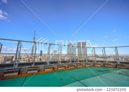 Urban Skyline with Modern Buildings Under a Clear Blue Sky, Japan Dec 8 2024 Urban Skyline with Modern Buildings Under a Clear Blue Sky, Japan Dec 8 2024 123872209