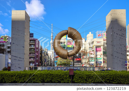 Urban Landmark Sculpture Under a Vibrant Blue Sky Surrounded, Japan Dec 8 2024 Urban Landmark Sculpture Under a Vibrant Blue Sky Surrounded, Japan Dec 8 2024 123872219