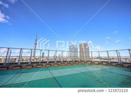 Urban Skyline with Modern Buildings Under a Clear Blue Sky, Japan Dec 8 2024 123872220