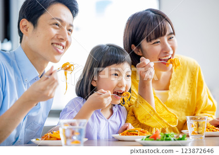 Young family, meal, dining table Young family, meal, dining table 123872646