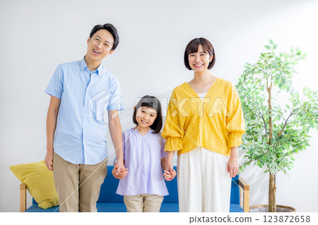 Hand holding family Hand holding family 123872658