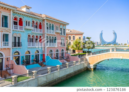 Qanat Quartier Venetian copy luxury residential district with authentic colorful apartment buildings and bridge over the canal, Pearl Island, Doha, Qatar Qanat Quartier Venetian copy luxury residential district with authentic colorful apartment buildings and bridge over the canal, Pearl Island, Doha, Qatar 123876186