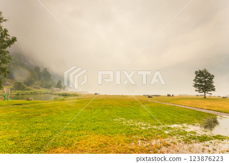 Foggy summer landscape in Norway Foggy summer landscape in Norway 123876223