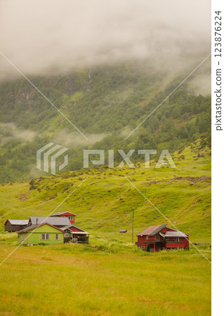 Misty mountains in Norway 123876224