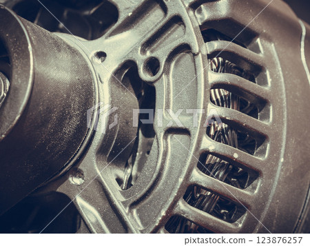 Detailed closeup of alternator generator machine engine 123876257