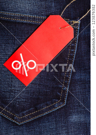 red label with percent sign on denim red label with percent sign on denim 123876382