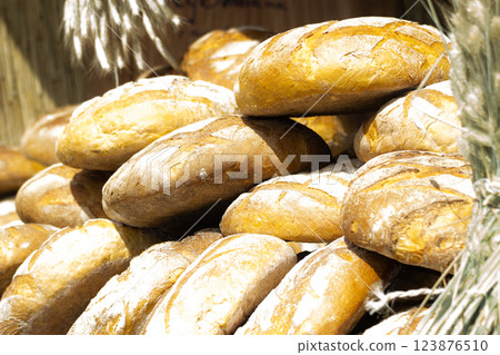 many brown rustic fresh rye bread loaves many brown rustic fresh rye bread loaves 123876510