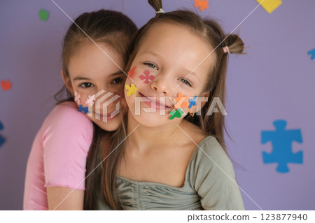 The concept of pride, support and caring for people with autism spectrum syndrome. Beautiful happy loving children 123877940