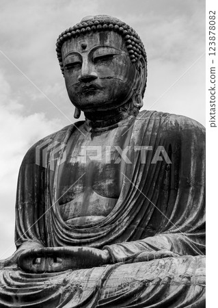 High contrast black and white vertical portrait of the Great Buddha statue at Kotoku-in temple 123878082