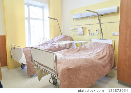 A hospital ward with two specially designed beds for patients awaiting hospitalization in the intensive care unit of a modern medical center. High quality photo 123878964