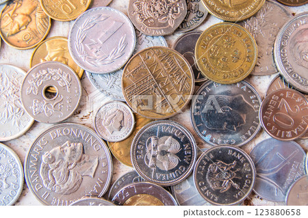 Old golden and silber coins. Money from France, Poland, Italy, England, Peru, Austria, Czech Republic, China, Croatia, Denmark, Netherlands. Financial concept for business. Old golden and silber coins. Money from France, Poland, Italy, England, Peru, Austria, Czech Republic, China, Croatia, Denmark, Netherlands. Financial concept for business. 123880658
