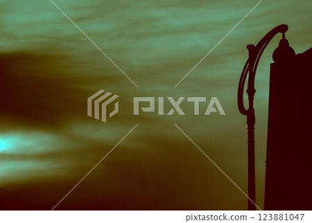 silhouette of a watering can and silhouette 123881047