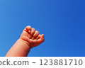Newborn's powerful fist 123881710