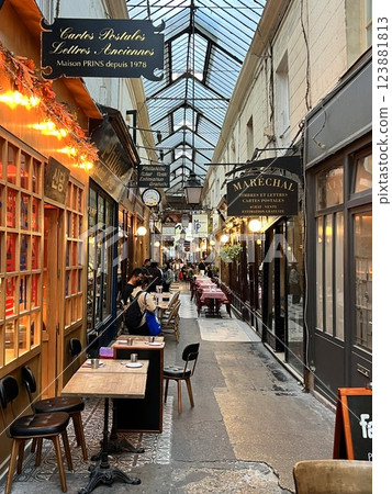 A passageway filled with fashionable restaurants in Paris A passageway filled with fashionable restaurants in Paris 123881813