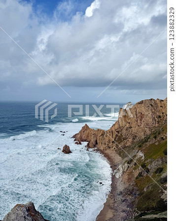 Cabo da Roca, the westernmost point of Europe, overlooking the Atlantic Ocean on the rocky edge 123882329
