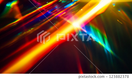 Multicoloured rainbow leak and light on black vintage background. Vivid colours mixing. Neon holographic colors gradient. Prism reflection, lens flare This is AI-generated item 123882378