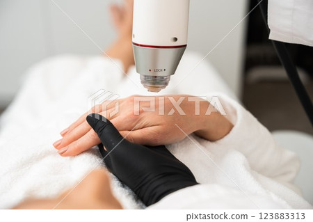 RF lifting in a beauty salon. 123883313