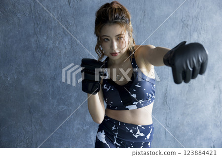 A woman who makes boxing A woman who makes boxing 123884421